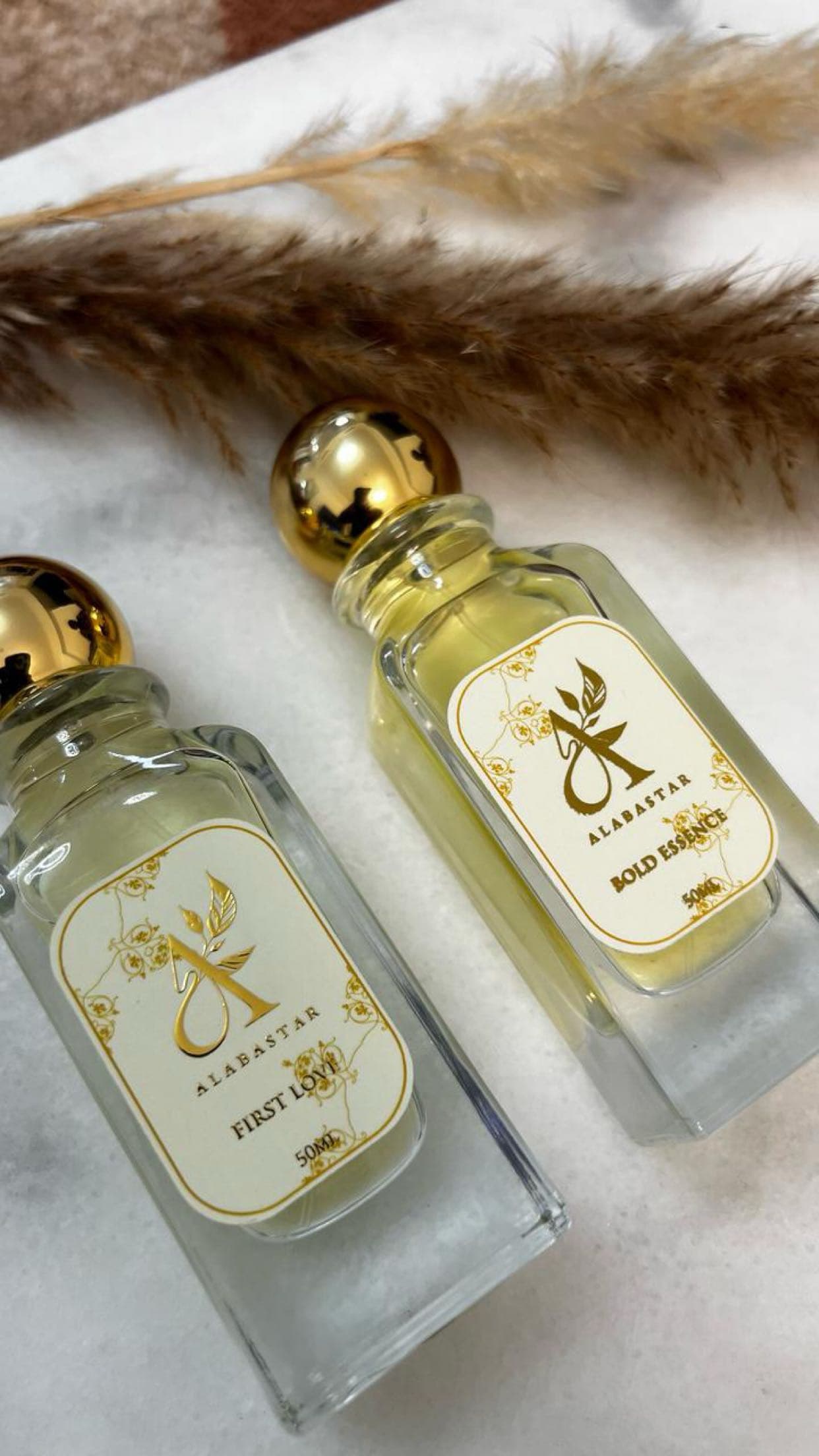 Alabastar perfume bottles on marble